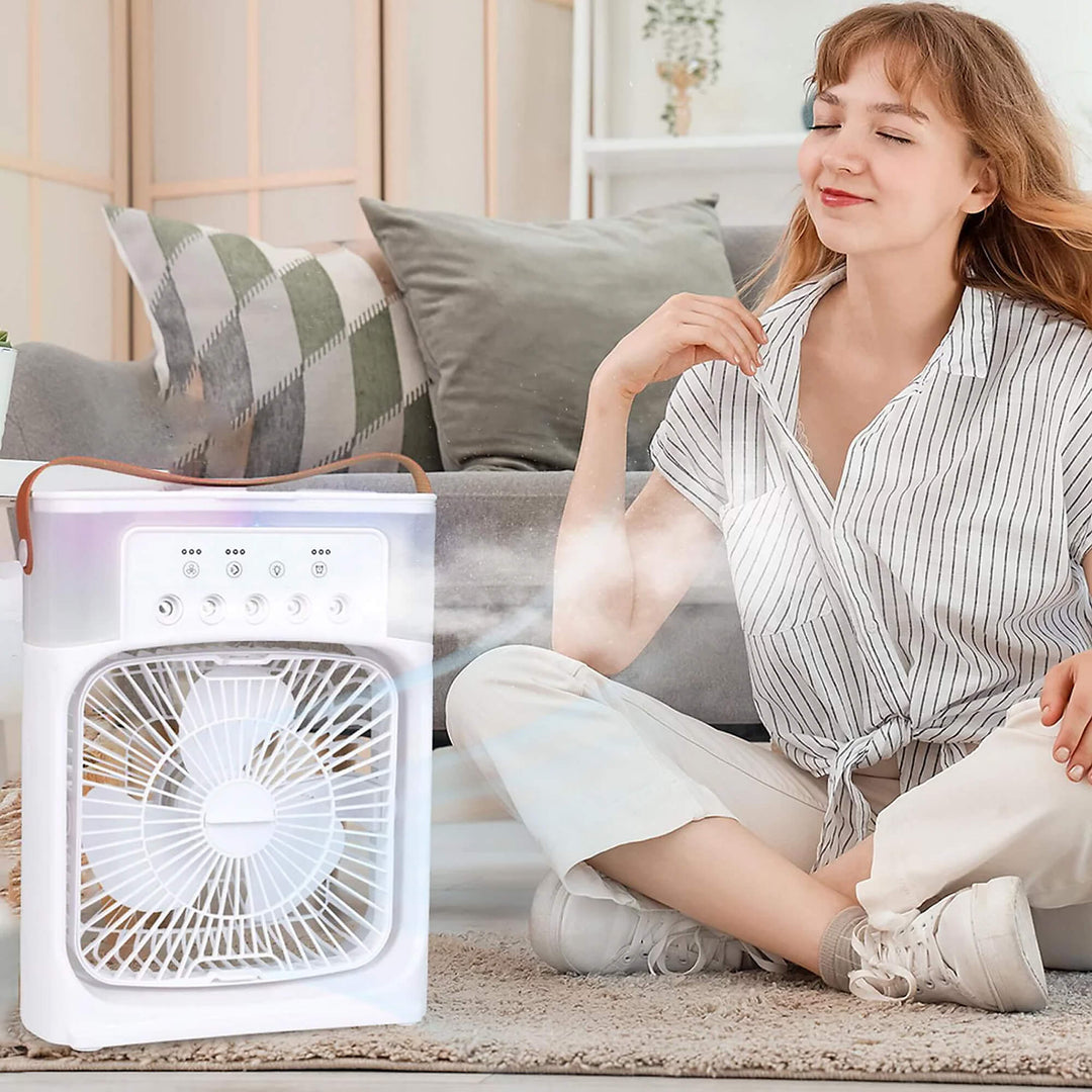 Compact portable air cooling device with humidification for a fresh environment.