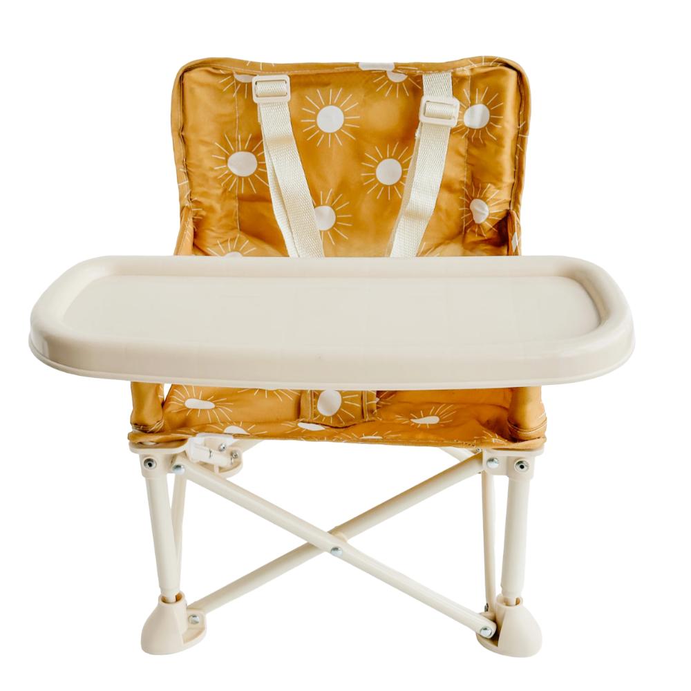 Infant booster seat: secure 5-point harness in a portable, lightweight outdoor picnic chair for baby safety.