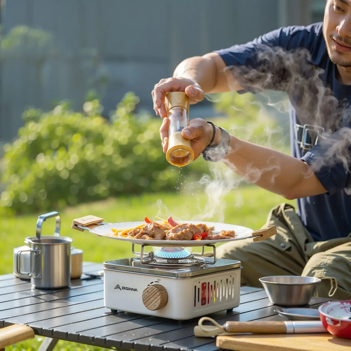 Portable camping gas stove, 2800W, ideal for outdoor cooking, hiking, and travel adventures.