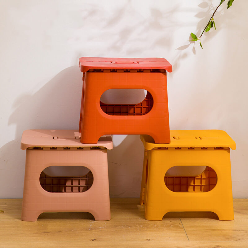 Folding step stool for home, portable design with handle, perfect for kids' bathroom & adult convenience.