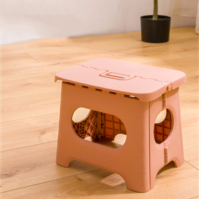 Unisex portable folding step stool for kitchen & bathroom, with handle, offers lightweight convenience for all ages.