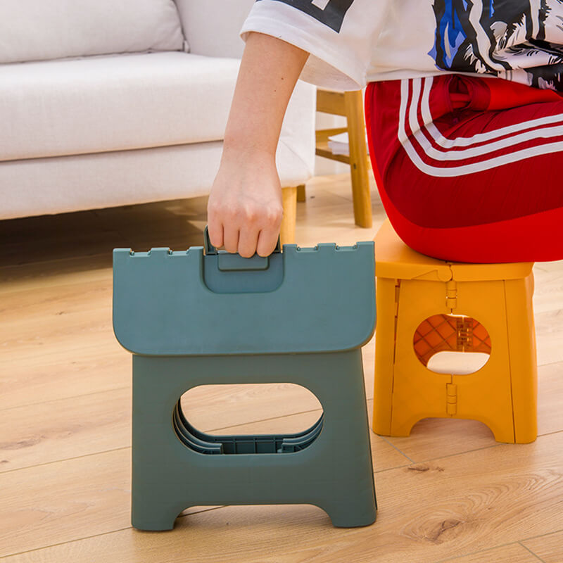 Versatile folding step stool, portable with handle for kitchen, bathroom, home. Suitable for kids & adults.
