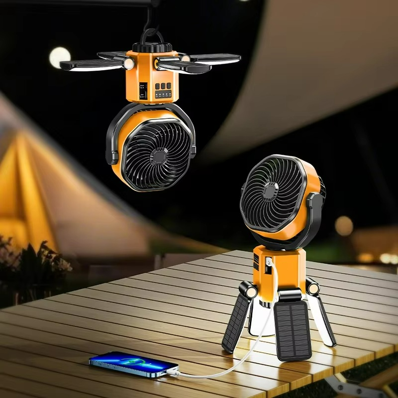 Yellow portable solar camping fan with integrated LED emergency light. Ideal outdoor & hiking gear; battery powered.