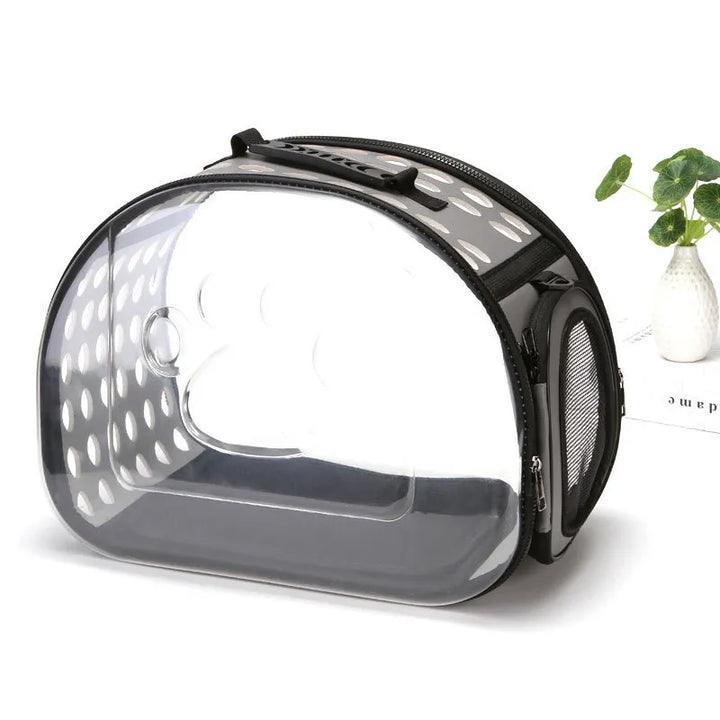 Convenient pet travel carrier for cars, ideal for small dogs & cats, offering a viewing window for their travel comfort.