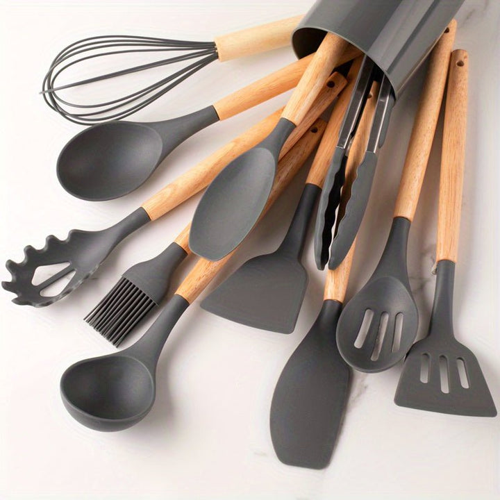 Heat-resistant silicone cooking tools with durable wooden handles, perfect for all your kitchen essentials.