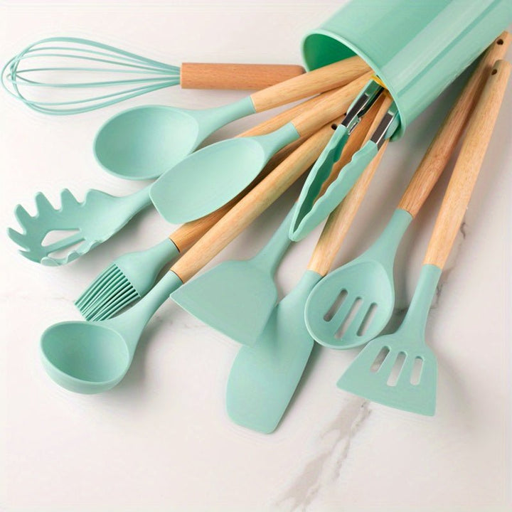 Dishwasher-safe silicone utensil set with wooden handles, premium non-stick kitchen tools for easy cleanup.