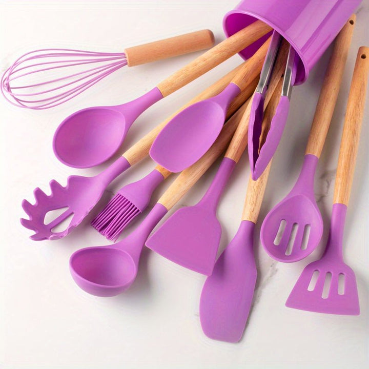 Soft silicone kitchen utensils with wooden handles, designed to protect non-stick cookware from scratches.