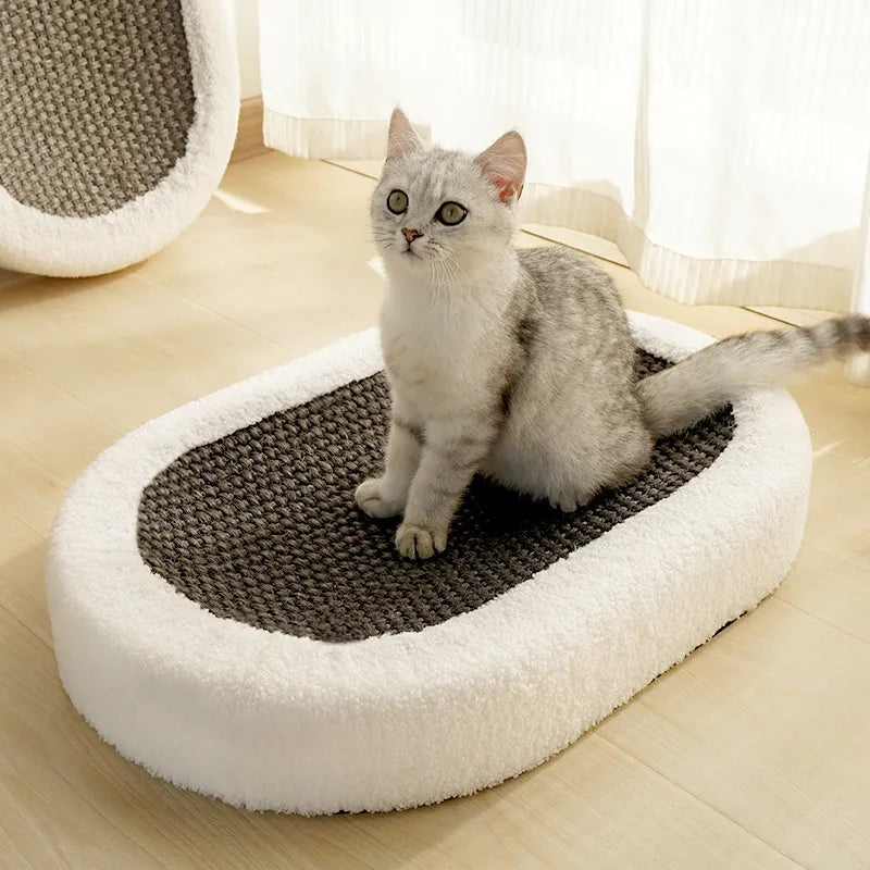 Happy cat napping in a cozy cat bed, next to the integrated scratching post. Comfortable pet furniture & supplies.