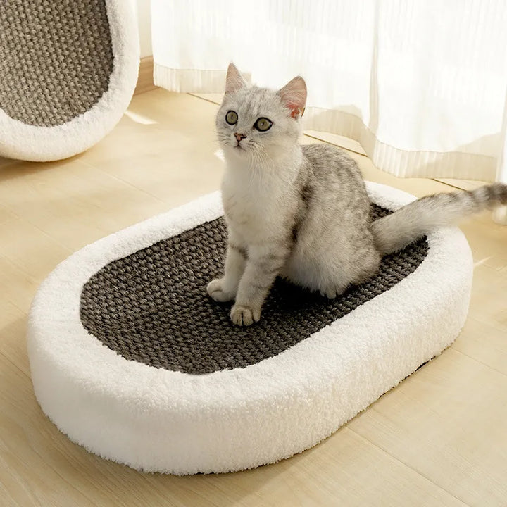 Happy cat napping in a cozy cat bed, next to the integrated scratching post. Comfortable pet furniture & supplies.
