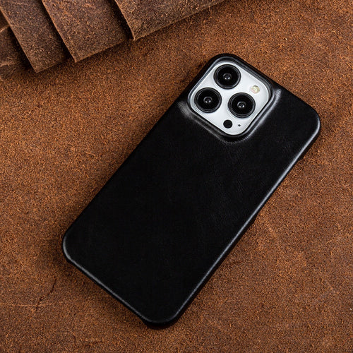 Premium phone accessory: slim leather iPhone case, shockproof, supports wireless charging.