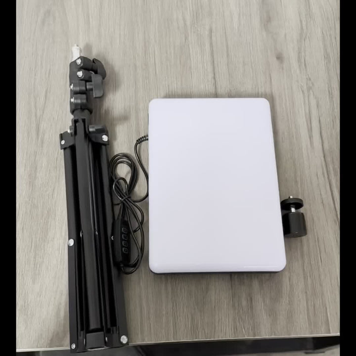Essential lighting equipment: adjustable stand with lamp for studio photography & video recording.
