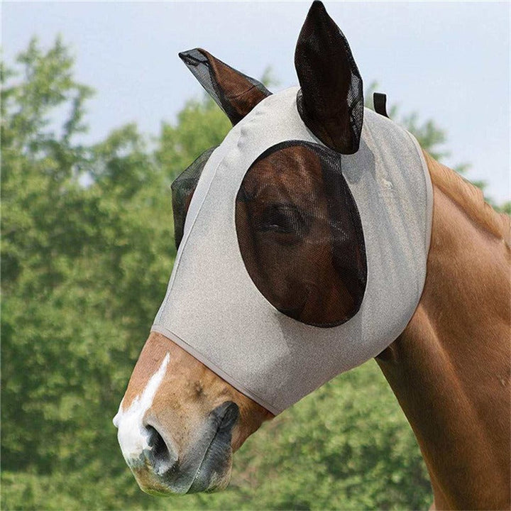 Stretch-fit horse fly mask providing UV protection and insect barrier for comfortable outdoor equestrian activities.