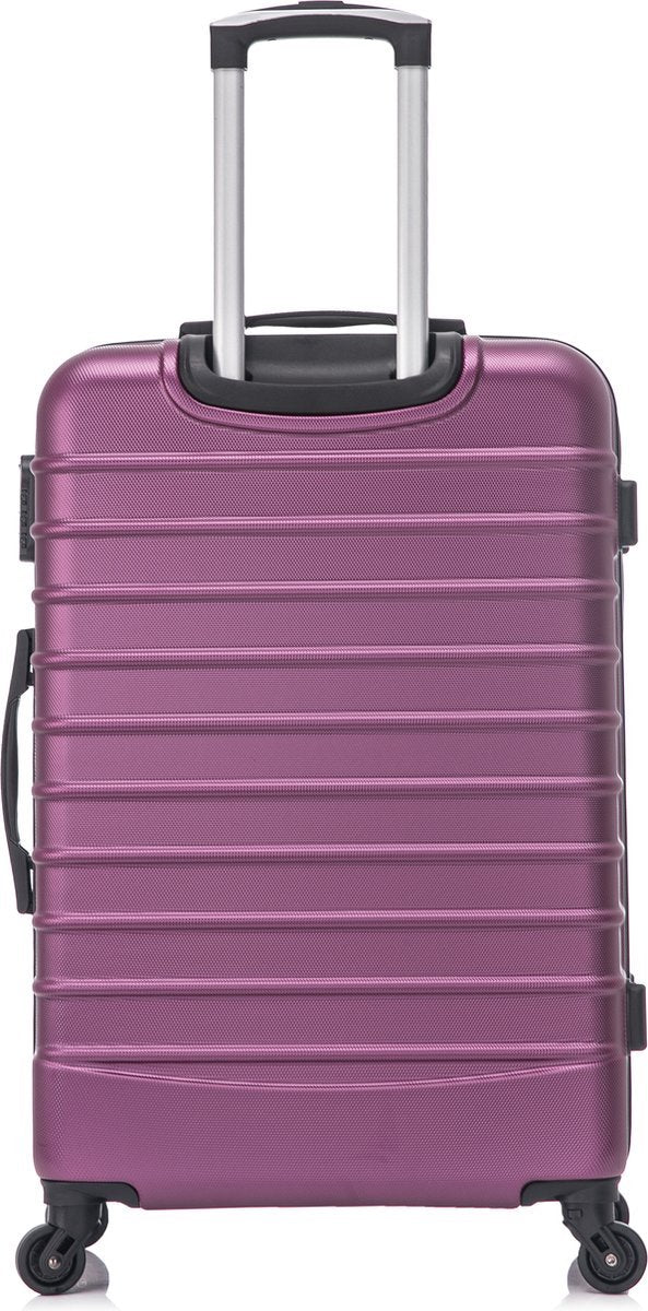 Close-up of the textured purple hard shell suitcase, highlighting its durable design.