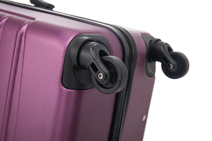 Premium purple hard shell luggage set, featuring ergonomic handles and 360-degree spinner wheels.