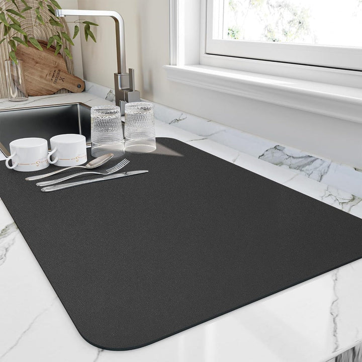 Kitchen countertop with a neatly placed Quick-Dry Absorbent Dish Drying Mat