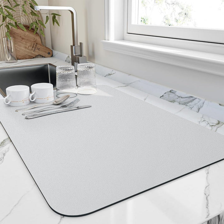 Quick-Dry Absorbent Dish Drying Mat supporting various kitchen utensils, new