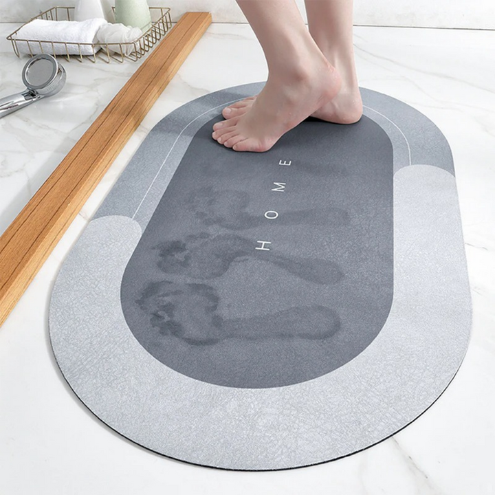 Quick-drying bath mat, highly absorbent & non-slip for a safer, drier bathroom. Modern diatomaceous earth floor mat.