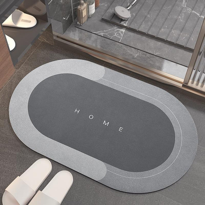 Quick-drying floor mat made from diatomaceous earth, highly absorbent and non-slip for superior bathroom safety.