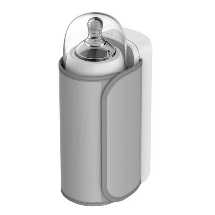 Sleek portable baby bottle warmer, rechargeable & travel-friendly. Warms milk to perfect temp for happy babies on-the-go.