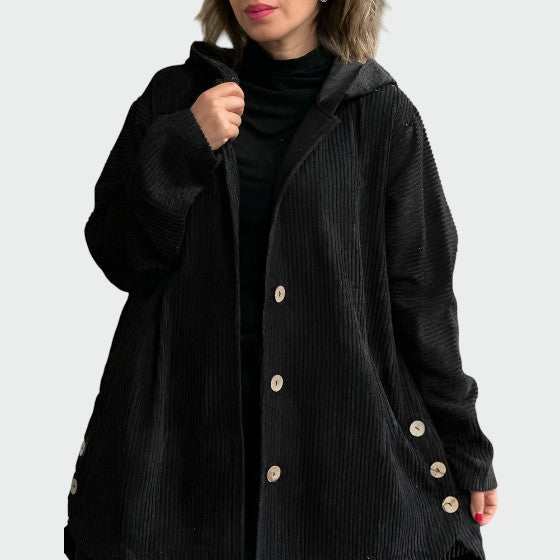 Close-up of a brown corduroy jacket with hood, ideal casual fall fashion.