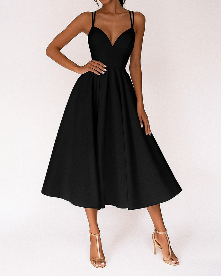 Green strappy midi dress, versatile and stylish for wedding guests or cocktail events