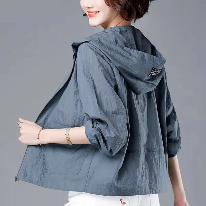 Stylish gray women's loose fit hooded jacket, ideal for casual spring wear, comfortable and versatile outerwear