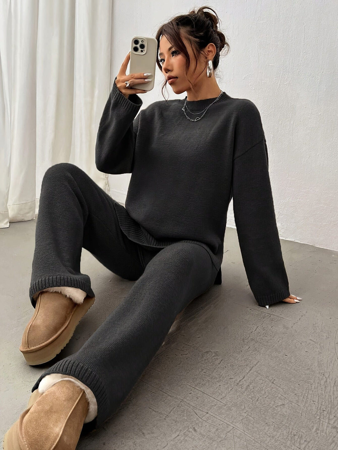 Stylish black relaxed fit spring set for women, comfortable and versatile two-piece outfit.
