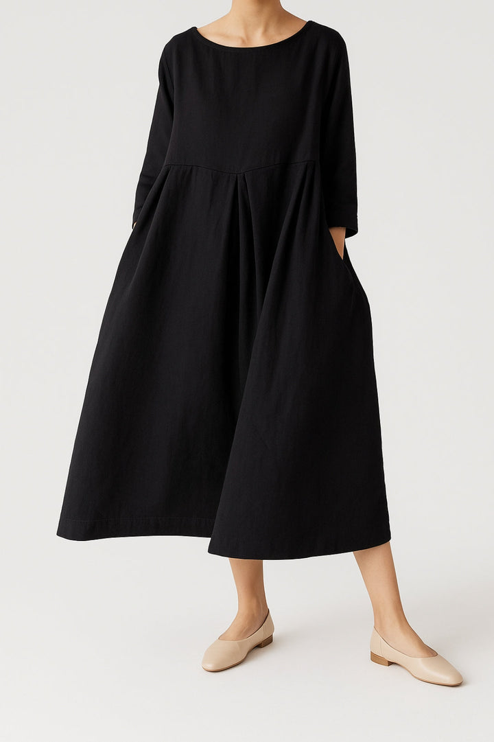 Army green relaxed fit midi dress with front pleats, comfortable and chic for everyday women's wear.