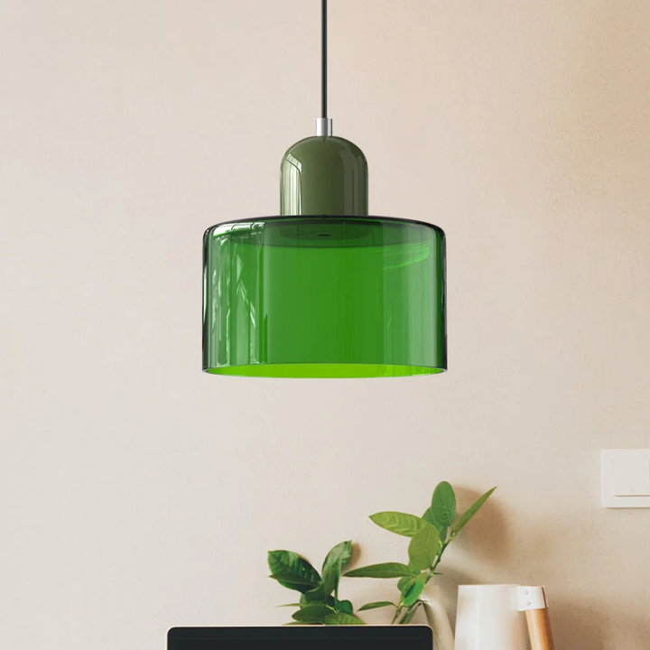 Mid-century modern inspired pendant with a unique glass shade and adjustable cable for warmth.
