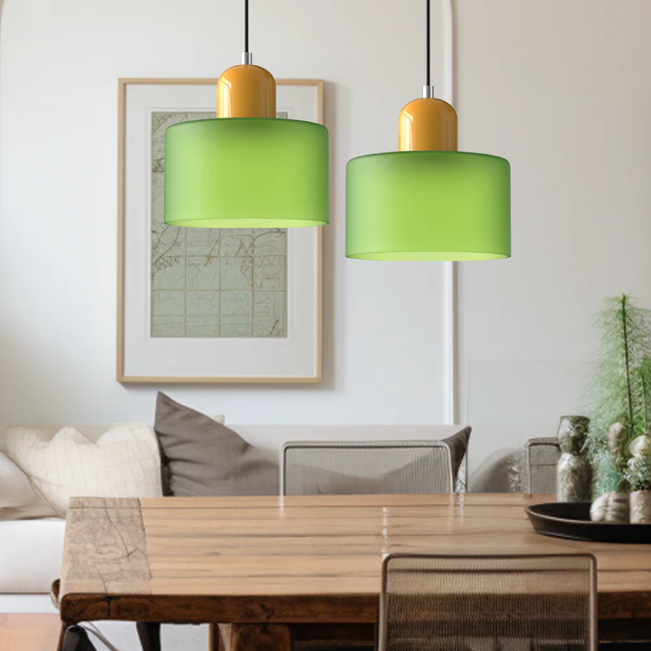 Decorative retro pendant light with clear glass shade, adjustable cord for a cozy kitchen.