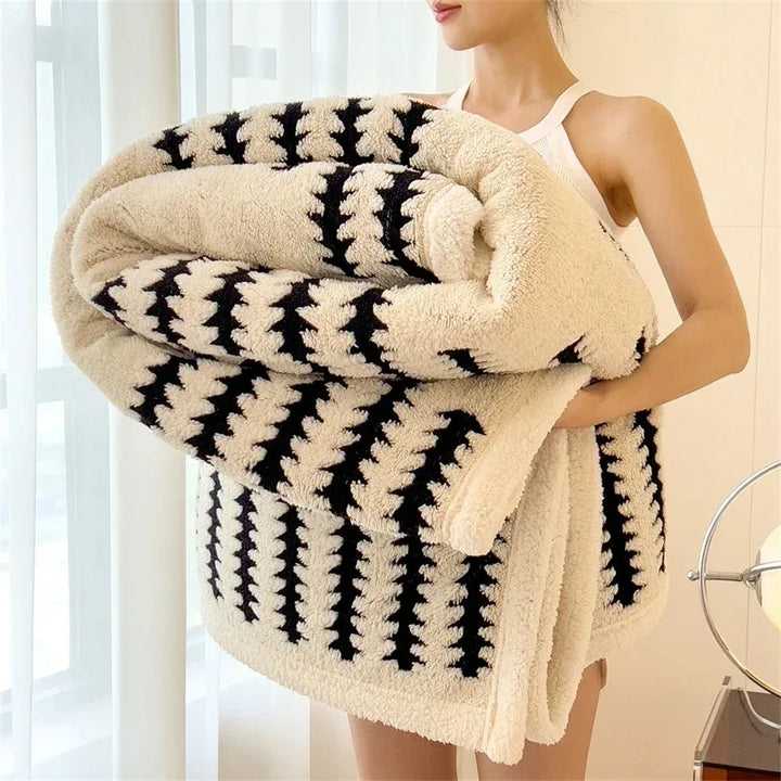 Soft & warm geometric throw blanket, reversible with cozy sherpa fleece. Ideal for living room decor.