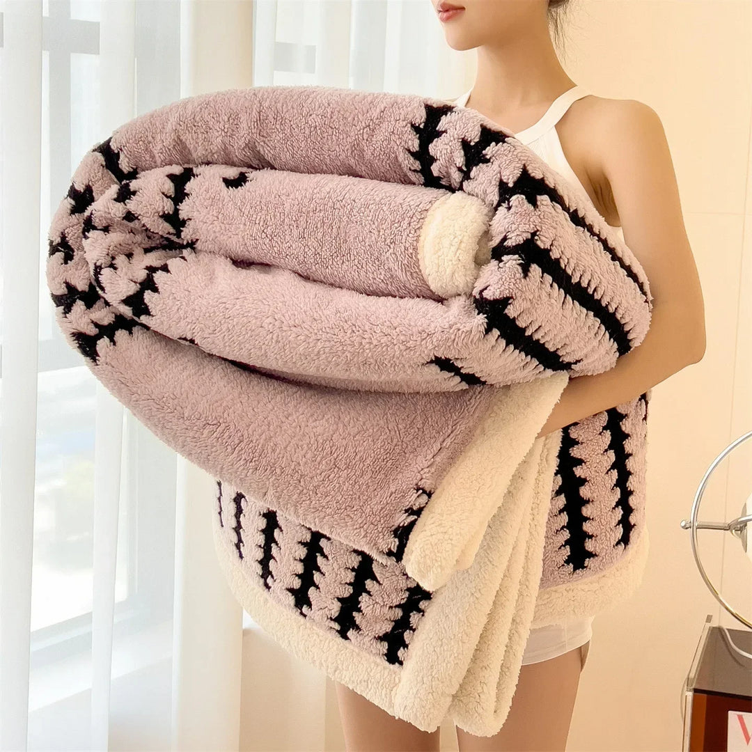 Modern geometric reversible throw for bedroom or living room. Soft sherpa fleece, warm decorative accent.