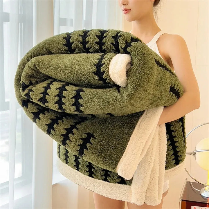 Plush, soft geometric pattern throw blanket, reversible with cozy sherpa. Warm home accent decor.