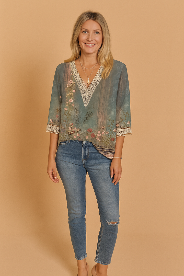 Stylish V-neck patterned blouse for women with romantic lace trim details. Versatile casual chic or dressy top.