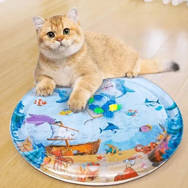 Round cat cooling water mat, blue, with fish patterns for interactive feline summer play and fun.