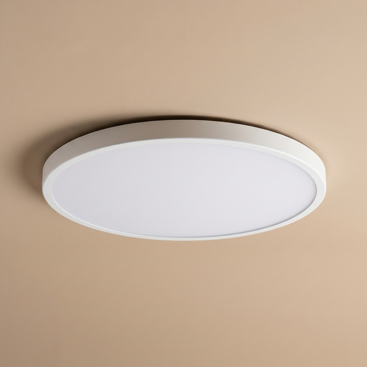 Versatile round LED light for ceilings, gold trim, slim and modern, perfect for living, bed, kitchen.