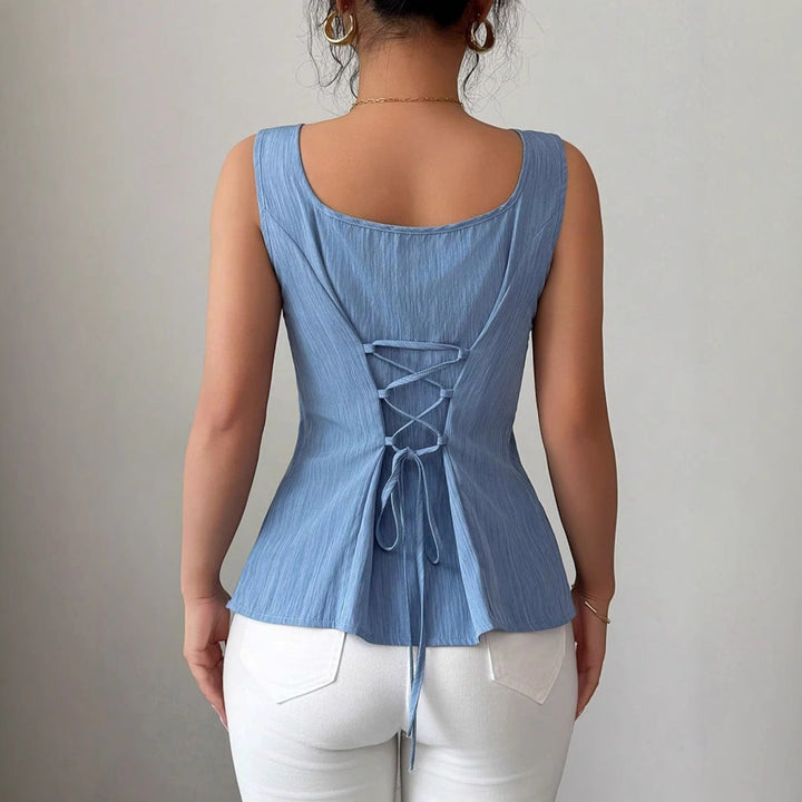 Elegant royal blue peplum top with a square neck and sleeveless design, a versatile women's summer fashion piece.