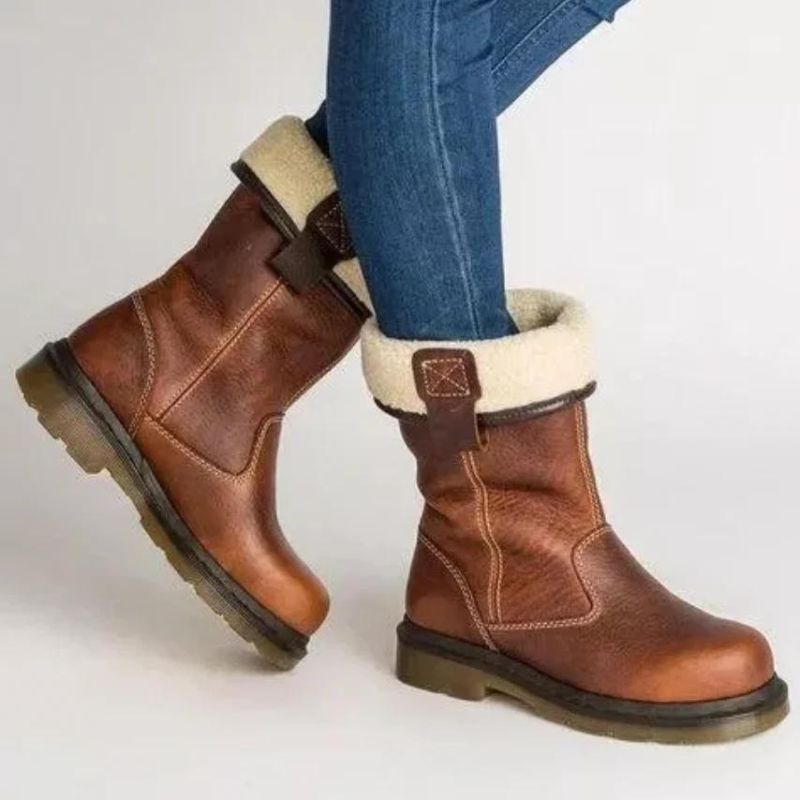 Rugged men's brown pull-on ankle boots. Comfortable, stylish, and durable for winter & casual wear.