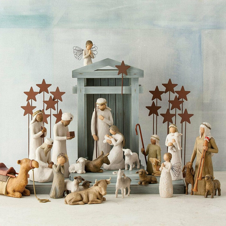 Rustic 20-piece wooden nativity set, handcrafted for Christmas home decor. Perfect for a traditional seasonal display.