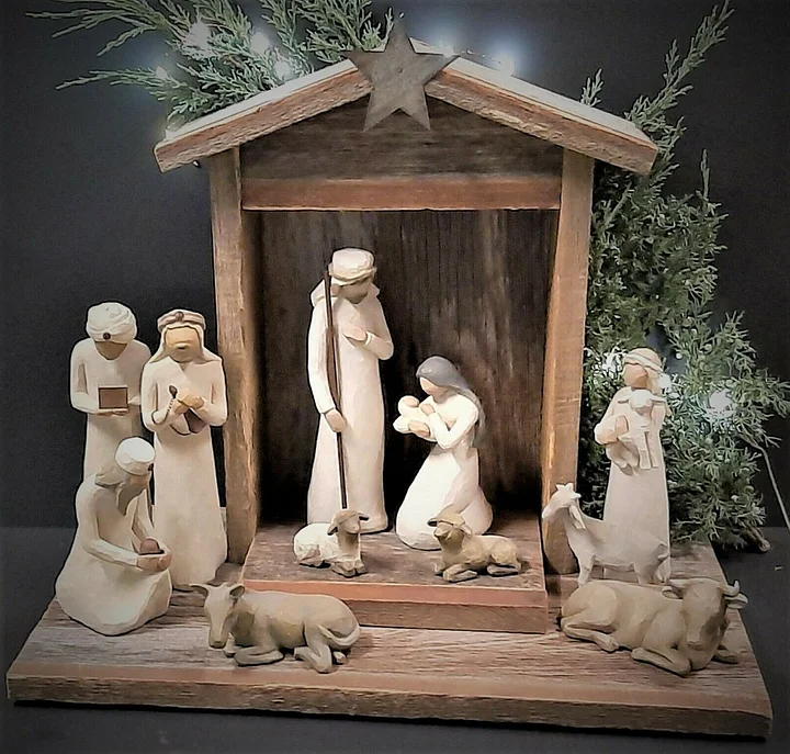 Handmade rustic wooden nativity set with 20 detailed pieces. Ideal Christian Christmas decor & spiritual display.