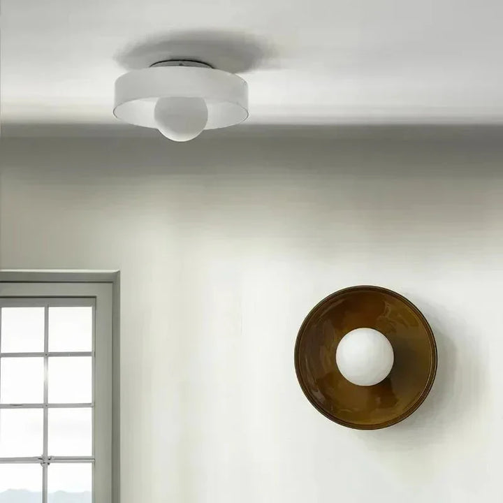 Sleek Scandinavian glass ceiling lamp, modern home lighting for contemporary interiors.