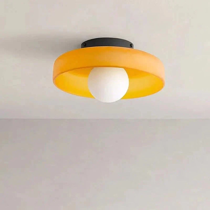 Atmospheric Scandinavian glass ceiling lamp, ambient lighting for modern home decor.
