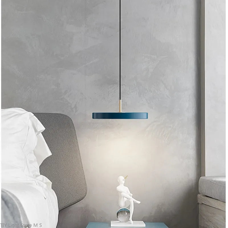 Stylish Scandinavian pendant light fixture, featuring a clean minimalist design and adjustable warm white light.