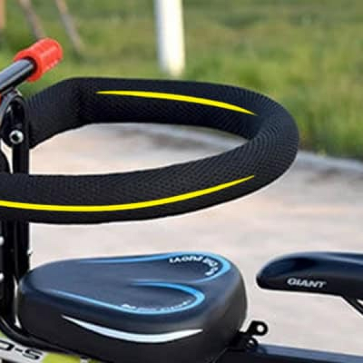 Family cycling toddler seat for adult bikes, providing a secure and comfortable outdoor adventure for kids.