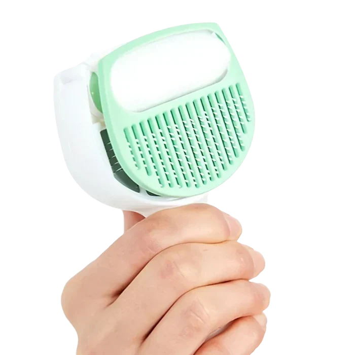 Comfort-grip self-cleaning pet brush for dogs & cats, making grooming a breeze for all pet owners.