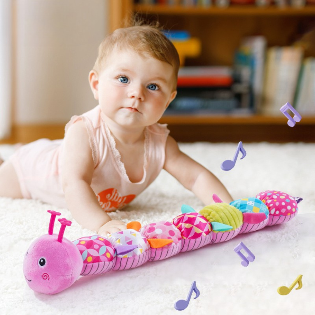 Colorful plush caterpillar baby toy with musical sounds, crinkles, & textures for engaging sensory play & learning.