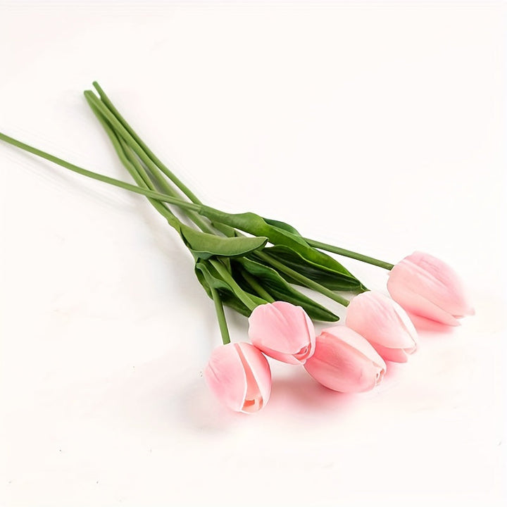 Decorate with 10 realistic artificial tulips. Ideal for spring centerpieces & special event decor.
