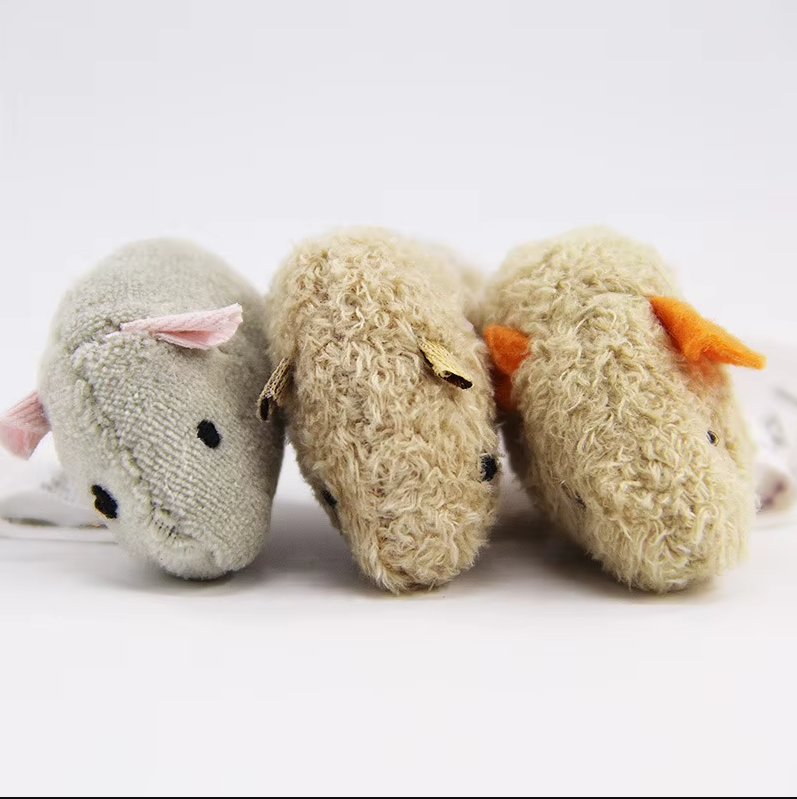 Durable plush mouse cat toys with realistic felt ears & tails, promoting healthy active play for cats.