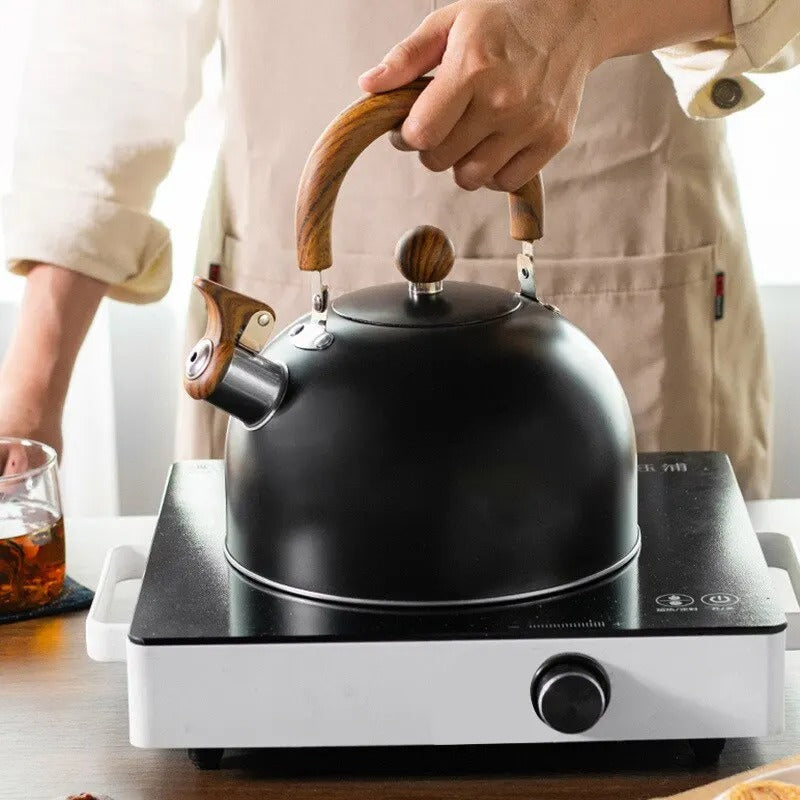 Ergonomic whistling stainless steel kettle with an insulated handle, ensures a safe grip while pouring hot water.