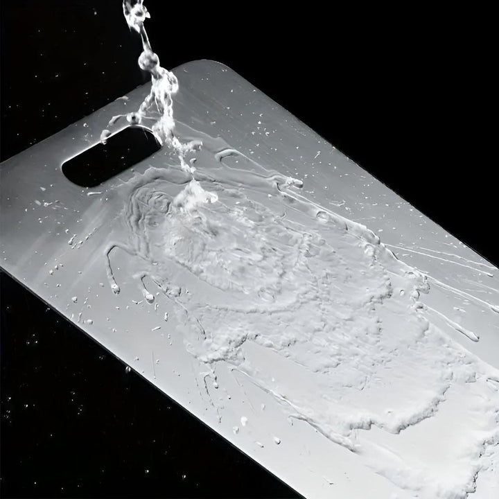 New hygienic stainless steel cutting board in silver, kitchen grade for food preparation